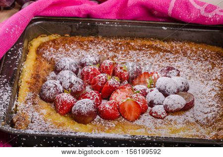 Pancake Cooking In A Plate With Fruit