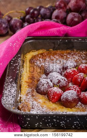 Pancake Cooking In A Plate With Fruit