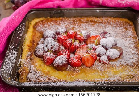 Pancake Cooking In A Plate With Fruit