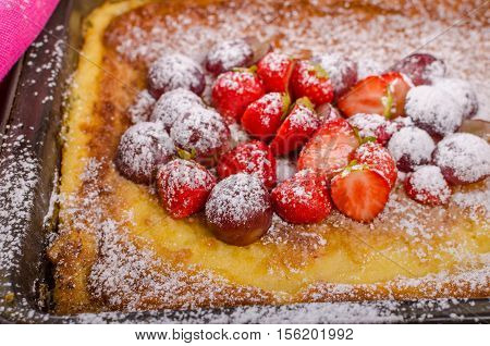 Pancake Cooking In A Plate With Fruit
