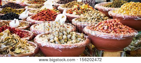 colorful food in pottery on a market