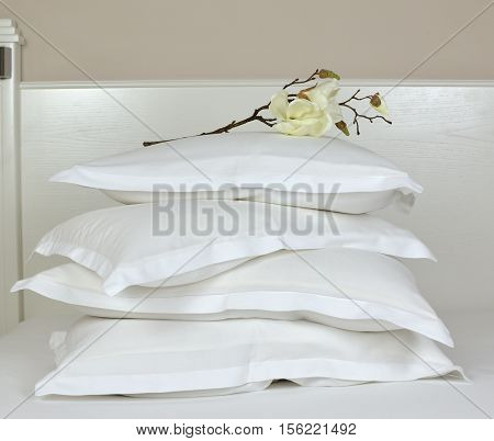 Pile Of White Sleeping Pillows