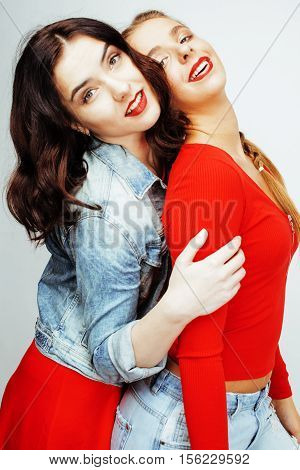best friends teenage girls together having fun, posing emotional on white background, besties happy smiling, lifestyle people concept close up