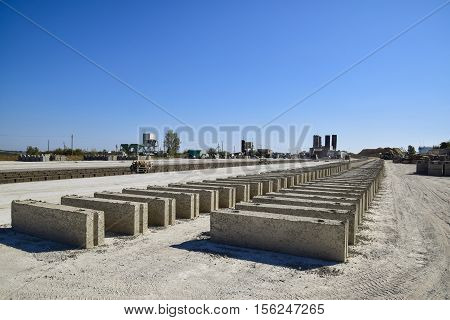 Cinder Blocks Lie On The Ground And Dried. On Cinder Block Production Plant.