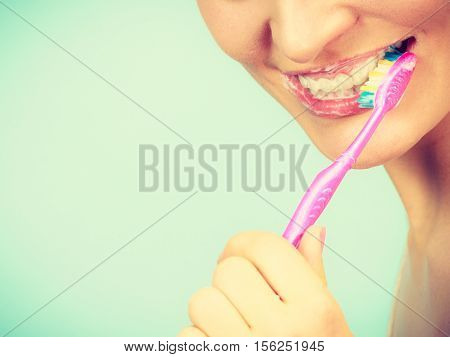 Woman Brushing Cleaning Teeth