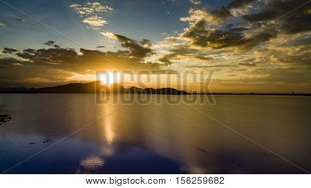 beautiful scenic of sun set sky at bangpra reservoir lake in chonburi eastern of thailand