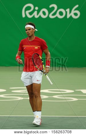 RIO DE JANEIRO, BRAZIL - AUGUST 7, 2016: Olympic champion Rafael Nadal of Spain in action during men's singles first round match of the Rio 2016 Olympic Games at the Olympic Tennis Centre
