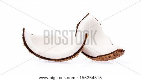 Old Brown Organic Coconut Fruit Copra Broken Into Pieces And Stacked On White Background