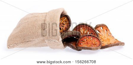 Burlap Sack Of Dried Bale Fruit Isolated On A White Background