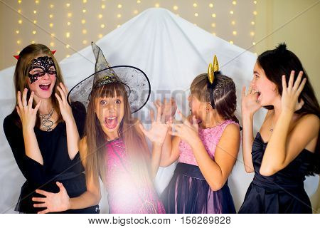 Group Of Teenagers Wearing Halloween Costumes Fear Of Ghost