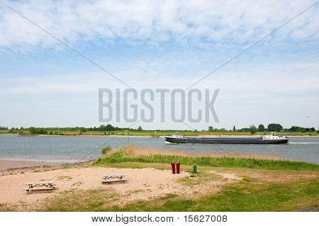 Big boat at the Dutch river the Lek