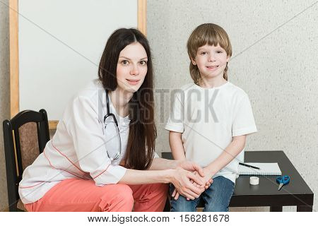 A child on reception at the doctor. Treatment in children's hospitals.