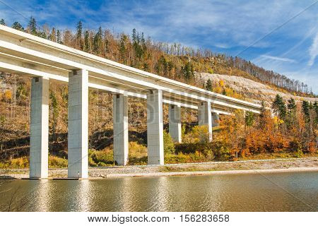 Highway bridge over the Bajer Lake in Fuzine, Gorski kotar, Croatia
