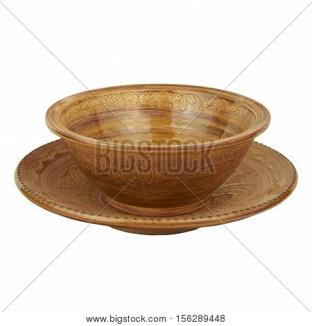 Deep and shallow ceramic dish monochrome handmade clay. Dishs are decorated with ornaments. Isolated on a white background