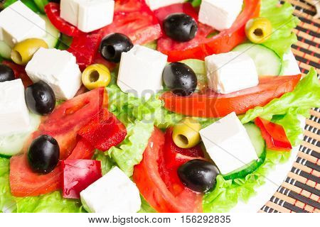 Greek salad with feta cheese and olives