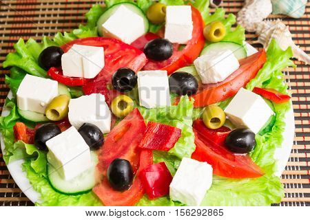 Greek salad with feta cheese and olives