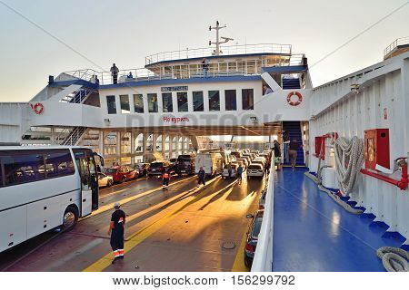 Download Car Ferry On The Ferry Crossing To The Crimea At Sunset