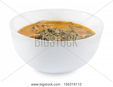 Thai Cuisine and Food A Delicious Spicy Creamy Coconut Milk Curry with Cassia Leaves and Grilled Beef Fillet Isolated on White Background.