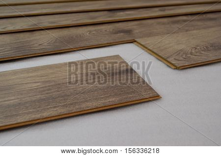 laying laminate flooring and dark wood colors - floor laying