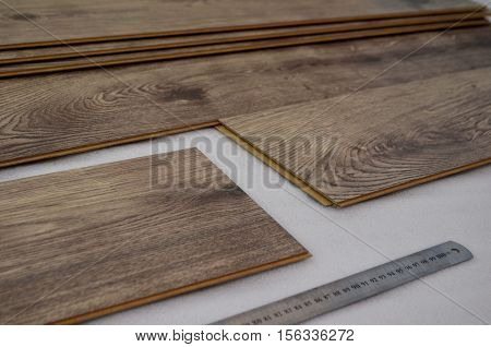 laying laminate flooring and dark wood colors - floor laying