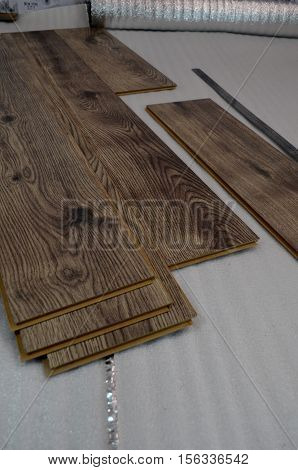 laying laminate flooring and dark wood colors - floor laying