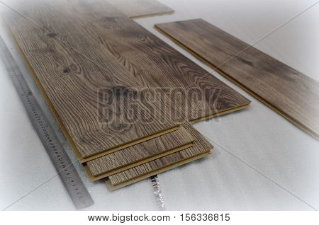 laying laminate flooring and dark wood colors - floor laying