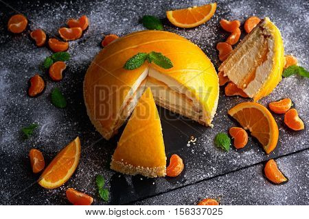 Orange Cake witch mousse, Mandarin saucea and fruit.