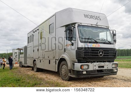 Tyumen, Russia - June 25, 2016: The 5th open championship of Russia on a plowed land. Special built trailer for transporting animals such as camels and horses