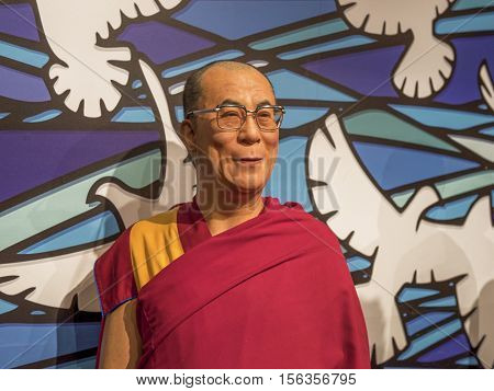 London, the UK - May 2016:  Dalai Lama wax figure in Madame Tussaud museum
