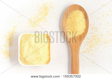 Corn Couscous into a bowl isolated on white background. Cuscus