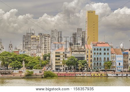 RECIFE, BRAZIL, JANUARY - 2016 - Cityscape view of eclectic style buildings at riverfront in Recife city Brazil