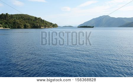Levkas GREECE May 11 2013: Panoramic view with blue sea and mountains in Ionian sea Greece.
