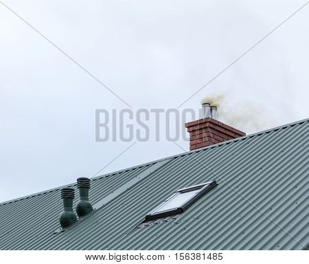 House Chimney With Flying Smoke