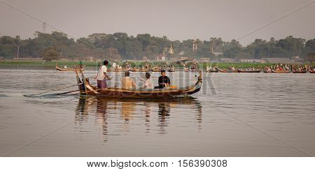 Wooden Boat Carrying Tourists On The Lake