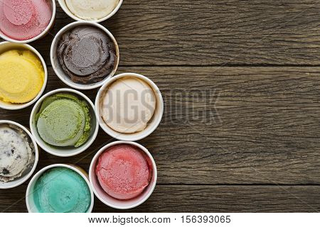 Top view Ice cream flavors in cup on blackground
