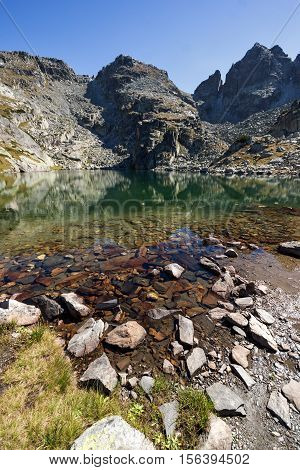 Landscape with Clean water of The Scary lake and Kupens peaks, Rila Mountain, Bulgaria
