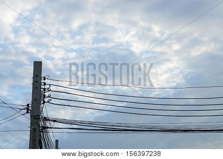 electricity pole with electricity wire in blue sky