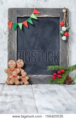 Christmas decoration with Happy Gingerbread man family and chalkboard