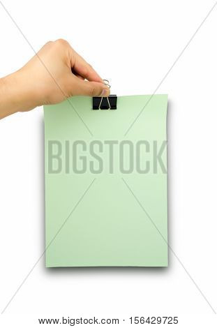 close up of hands holding a paper clip green