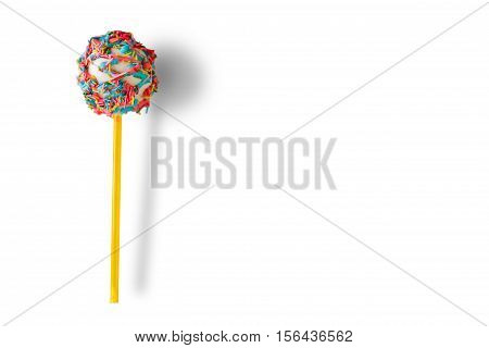 Cake pop with sprinkles. Candy on white background. Eat well and have fun. Boost your mood.
