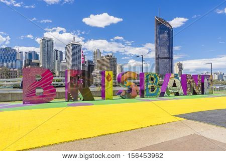 Brisbane, Australia - September 25, 2016: View of Brisbane sign with skyscrapers in the background in South Bank, Brisbane during daytime.