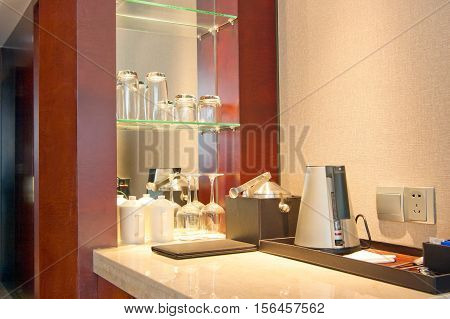 Ice bucket and electric kettle (hotel rooms).