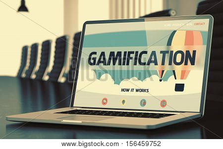 Gamification on Landing Page of Laptop Display in Modern Conference Hall Closeup View. Toned Image. Selective Focus. 3D.