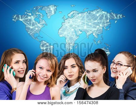 Young women talking on phone with world map overhead. Communication concept. Elements of this imafe furnished by NASA.