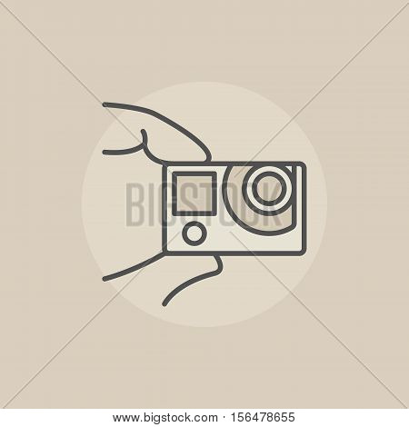 Action camera colorful icon. Vector flat extreme action cam in fingers sign or logo element