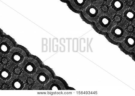 Vintage black lace as a frame on white background