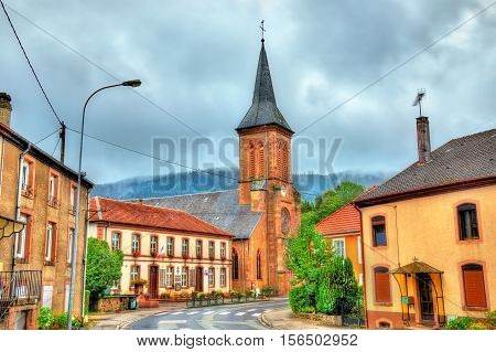 La Petite-Raon, the town hall and the Church of St. Sebastian and St. Quirinus - the Vosges Department, France