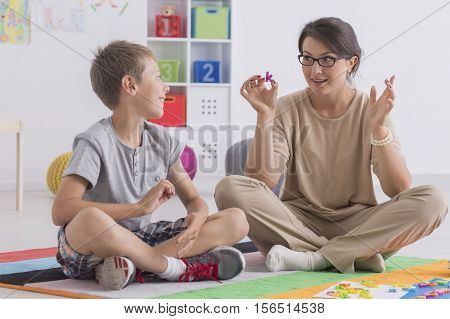 Professional Babysitter With A School-boy
