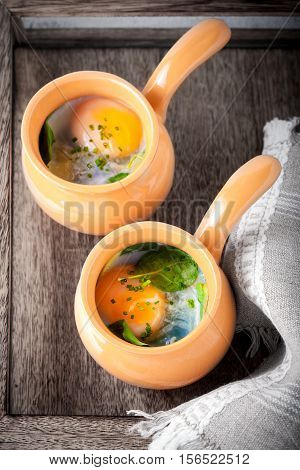 Casserole with eggs, spinach and parmesan for breakfast.