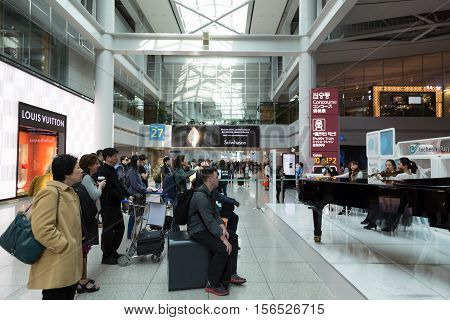 March 8 2016: South Korea Incheon International Airport Korea National live performance in traditional cultural experience center located in the passenger terminal. Concert of classical music for transit passengers. Passengers from different countries are